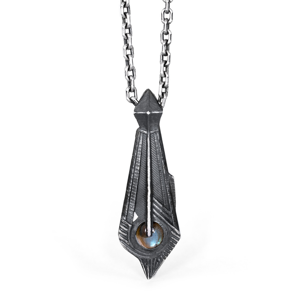 Memory Pendant — hero The Memory Pendant in oxidized sterling silver, an art deco spearhead form set with a labradorite cabochon, by Ether Eleven.